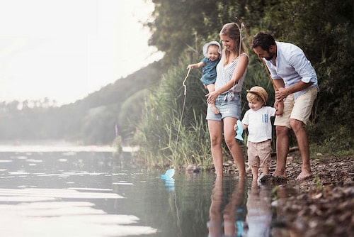 happy family along lake